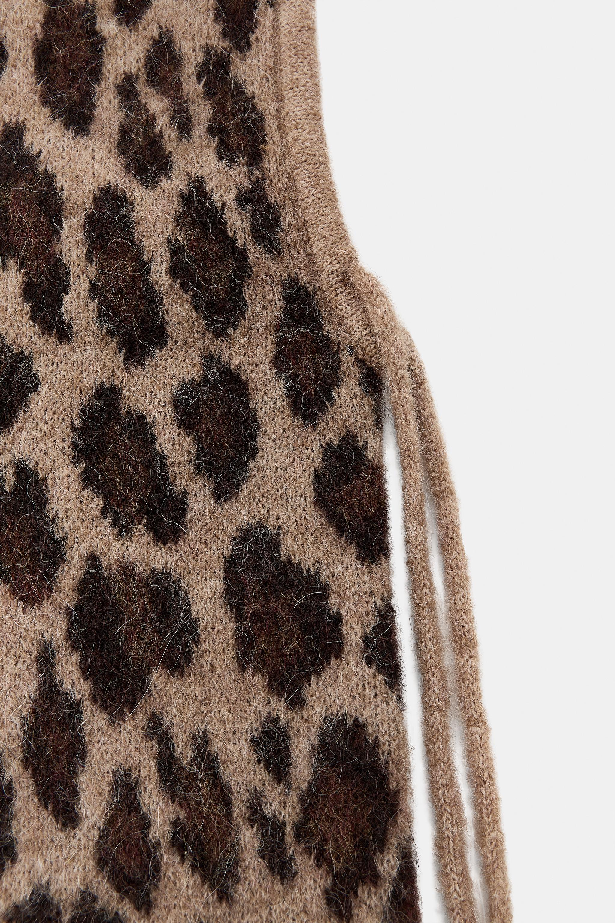 ANIMAL PRINT KNIT HOOD